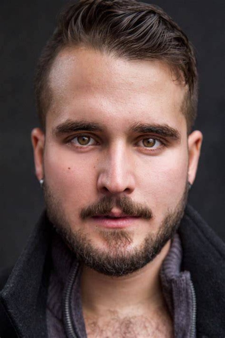 Daniel Samonas posing for a modeling shoot.