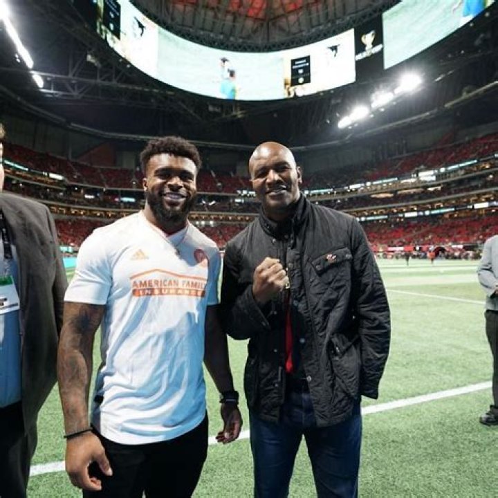 Evander Holyfield with his son Evander Holyfield Jr. at his birthday